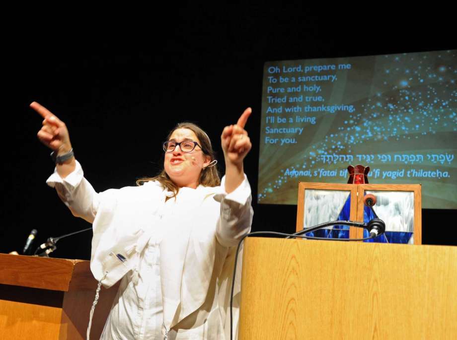 Rabbi Chaya leading High Holiday family services.